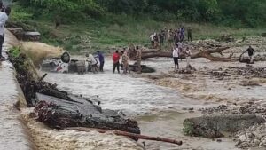 Tourist's Car Swept Away In The River